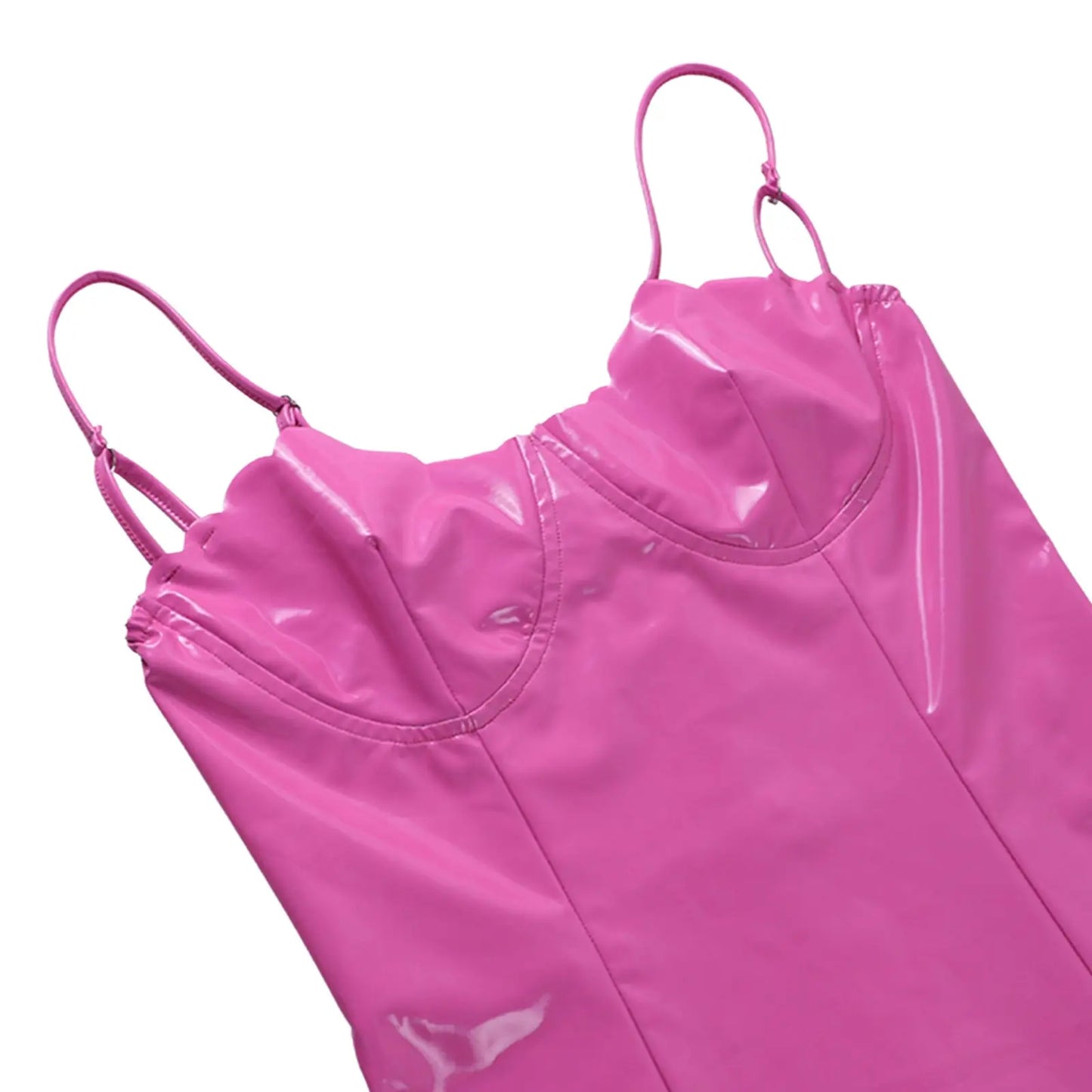 a pink umbrella sitting on top of a pink surface 